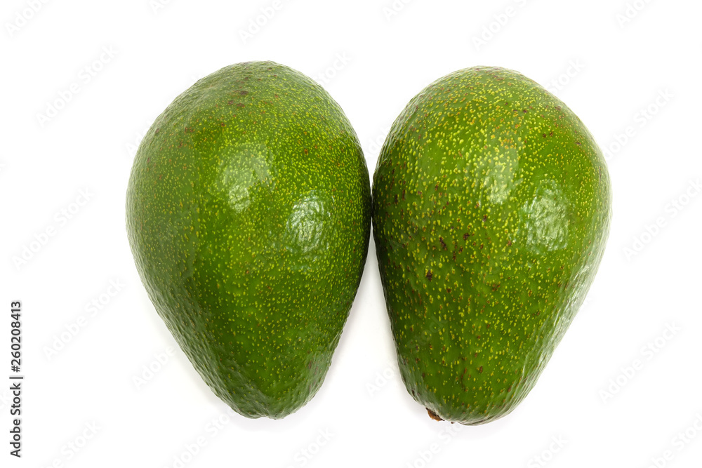 Two whole green avocado fruits on a white background Two whole green avocado fruits on a white background