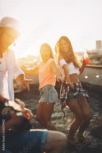 Sticker Group of happy friends having party on rooftop