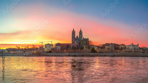 Panoramic view of bloody sunset in front of cathedral in Magdeburg  Germany  Spring  red cloudy sky