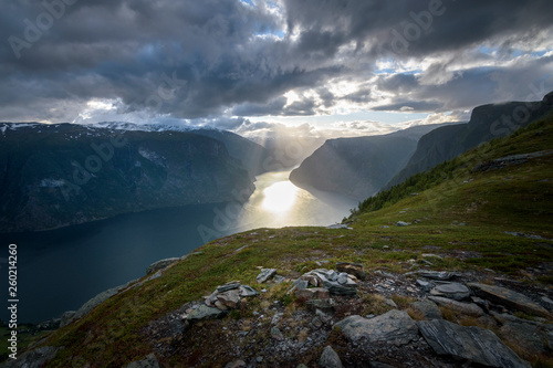 Fototapeta Naklejka Na Ścianę i Meble -  Beautiful sun beam in the Aurlandfjord from Prest viewpoint in stunning mountain scenery Norway