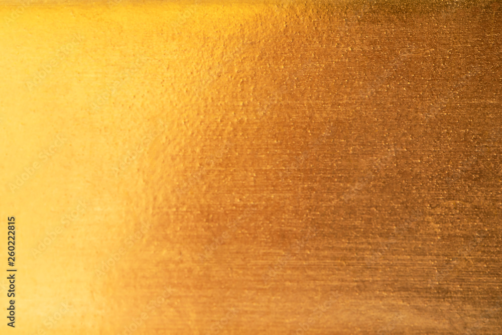 Naklejka premium Gold abstract background or texture and gradients shadow