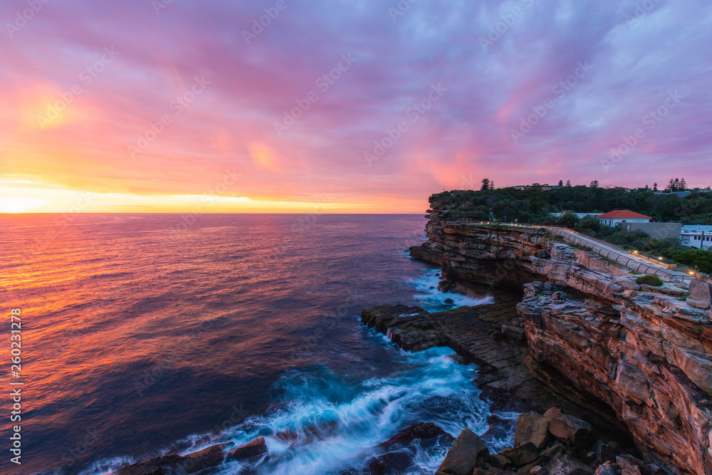 Colorful sunrise clouds view over The Gap cliff, Watsons Bay, Sydney, Australia.