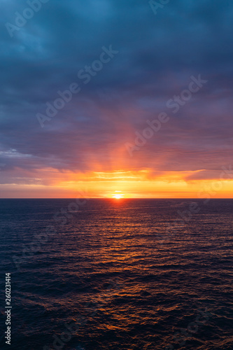 Cloudy sunrise view over the ocean horizon. © AlexandraDaryl
