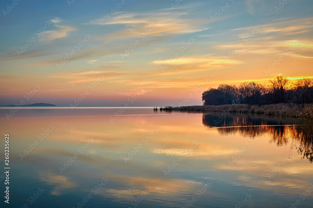 Sunset landscape over the lake Balaton in Hungary, autumn evening light