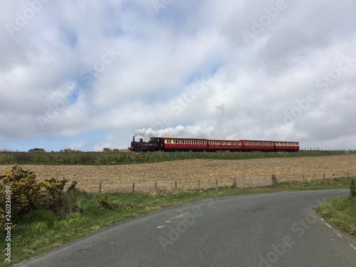 A steam train passing in the vicinity of Port Soderick, Isle of Man.