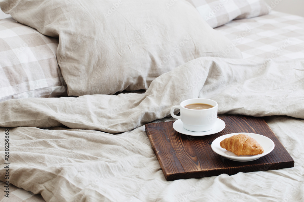 coffee on tray on the bed in bedroom coffee on tray on the bed in bedroom