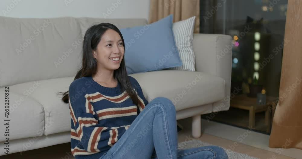 Woman watch tv at home Woman watch tv at home