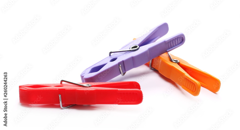 Colorful plastic clothespins isolated on white background Colorful plastic clothespins isolated on white background