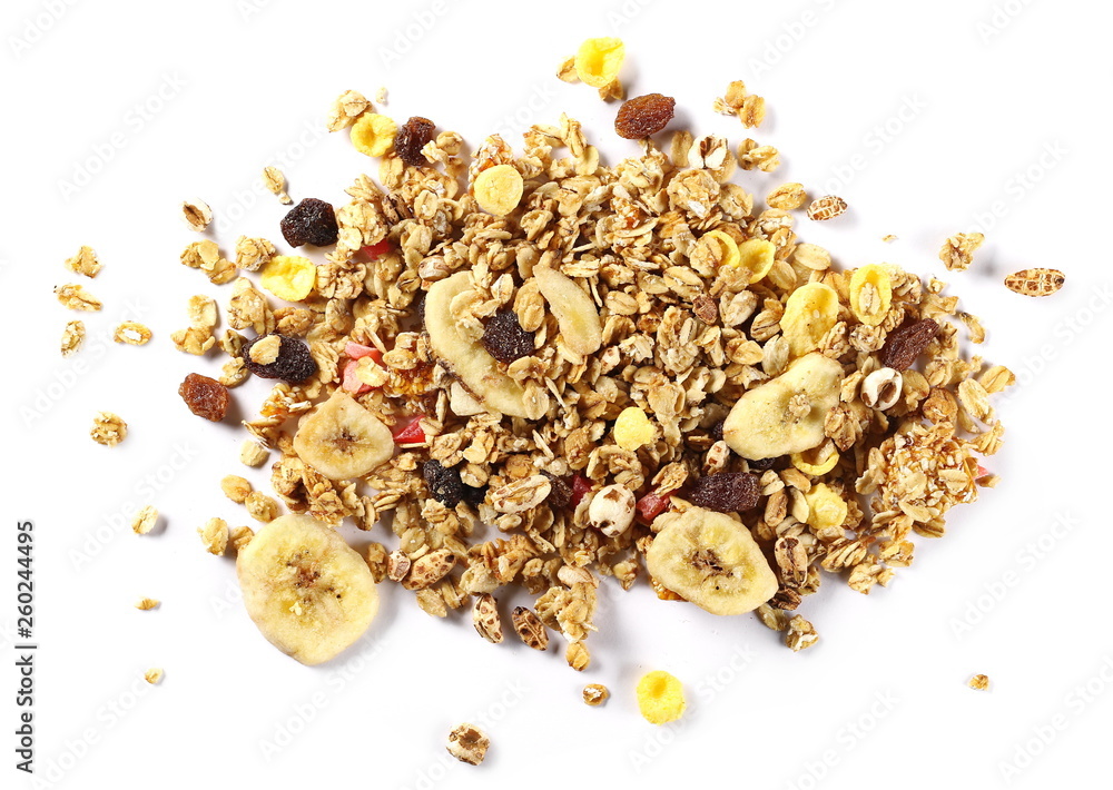 Crunchy tropical muesli pile mix with banana, pineapple, papaya slices and raisins isolated on white background Crunchy tropical muesli pile mix with banana, pineapple, papaya slices and raisins isolated on white background