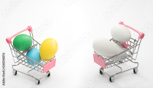 White eggs in a shopping cart, perfect sale, deal, promotional background photo