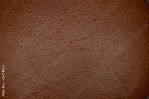 Texture of genuine leather close-up, brown color print. For your background, backdrop, with copy space 