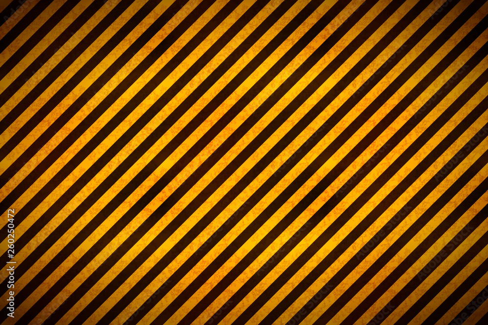 Warning yellow and black stripes with grunge texture, industrial background