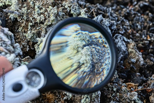 magnifier increases gray white mineral on earth