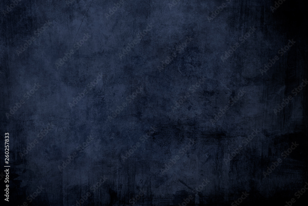 Dark blue grungy distressed canvas bacground