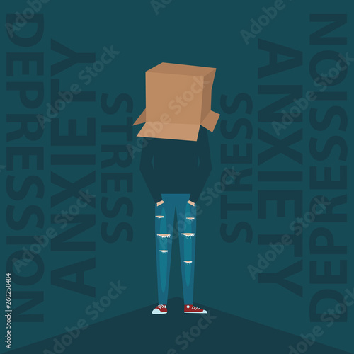 Sad teenager boy desperate hiding his face with the box. teenage depression and anxiety