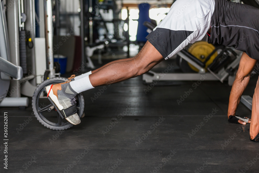 Black African American young man doing workout at the gym Black African American young man doing workout at the gym