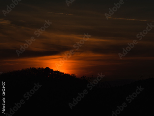Wallpaper Mural sunset time sun fall to mountain back side become to darkness  Torontodigital.ca
