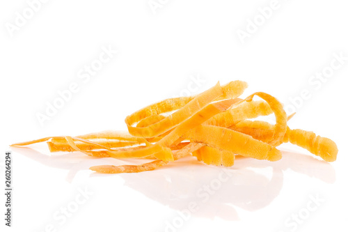 Lot of peel pieces of fresh orange carrot isolated on white background photo