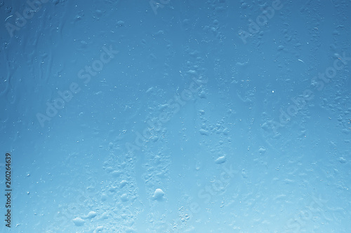 wet glass background condensate / abstract rain, drops texture on transparent glass