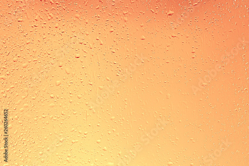 yellow tinted glass drops / abstract background texture