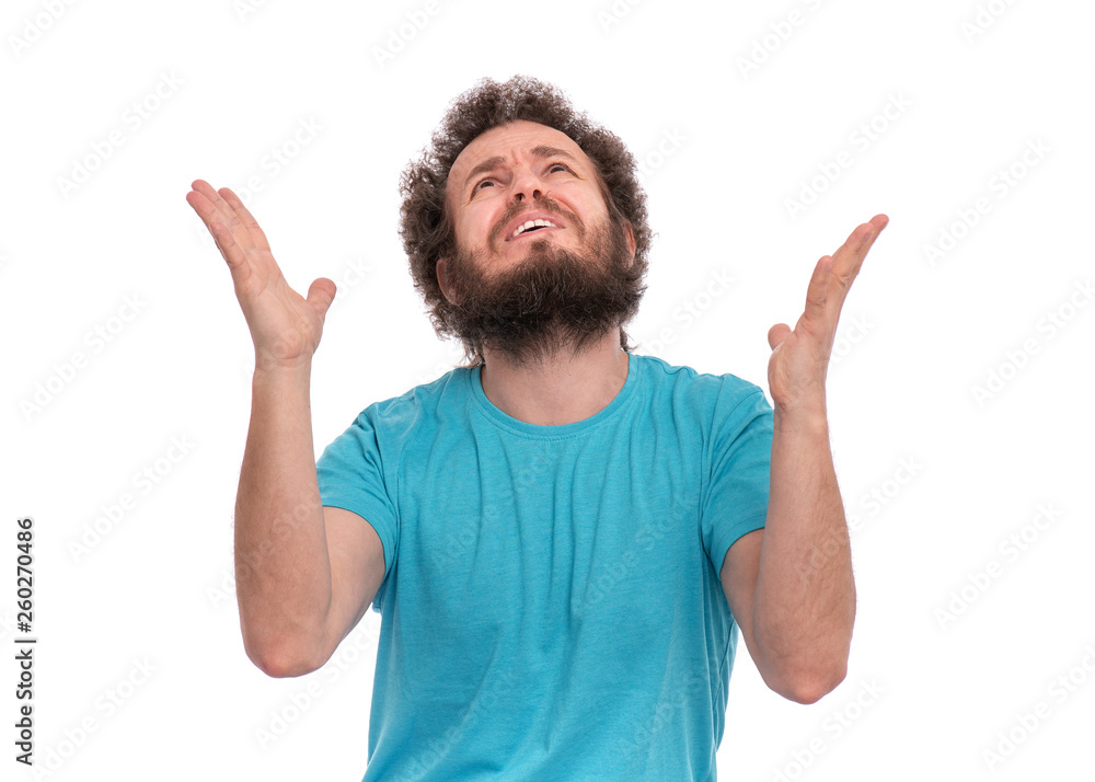 Portrait of caucasian crazy bearded Man with funny Curly Hair - saying prayers, isolated on white background. Religious image - Guy praying and praising God. Portrait of caucasian crazy bearded Man with funny Curly Hair - saying prayers, isolated on white background. Religious image - Guy praying and praising God.