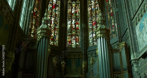 interior of cathedral church altar organ stained windows christ