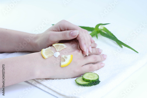 hands of a woman  cream cucumber