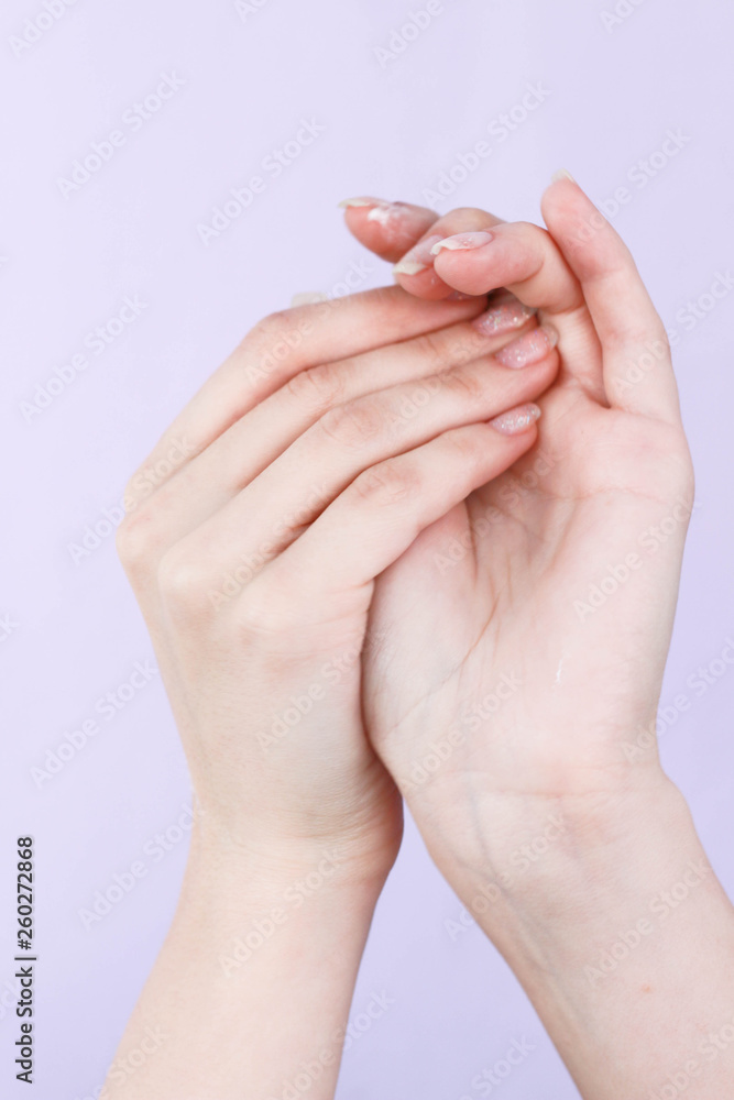 beautiful hands of a girl cream white background beautiful hands of a girl cream white background