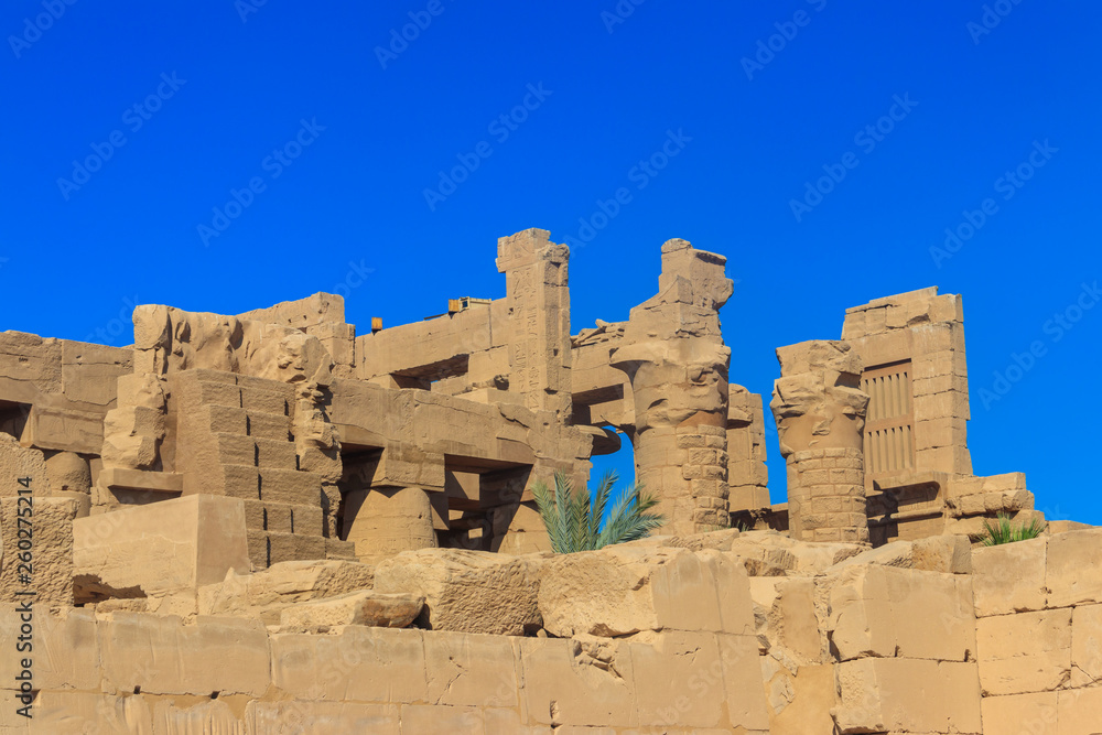 Karnak Temple Complex, commonly known as Karnak comprises a vast mix of decayed temples, chapels, pylons, and other buildings in Luxor, Egypt Karnak Temple Complex, commonly known as Karnak comprises a vast mix of decayed temples, chapels, pylons, and other buildings in Luxor, Egypt