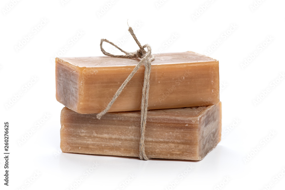 brown natural organic soap isolated on white - obrazy, fototapety, plakaty 