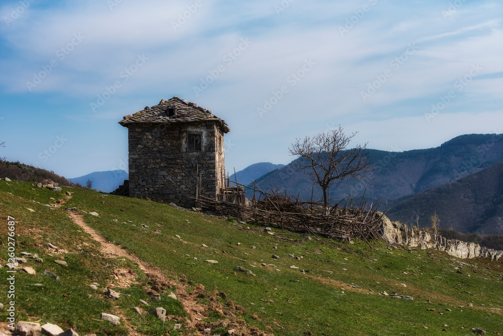 Old stone abandoned house in the mountain Old stone abandoned house in the mountain