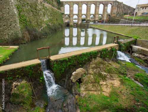 Nepi in Lazio, Italy. Medieval aqueduct and ancient walls