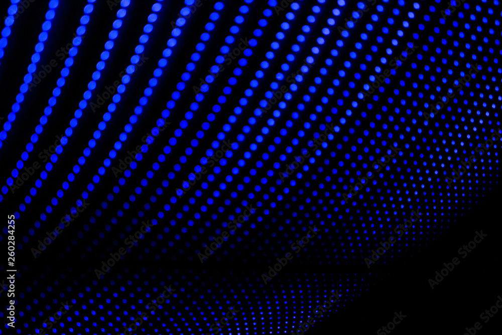 Abstract lines of blue color. Painting made with light. Abstract pattern of lines formed by points.