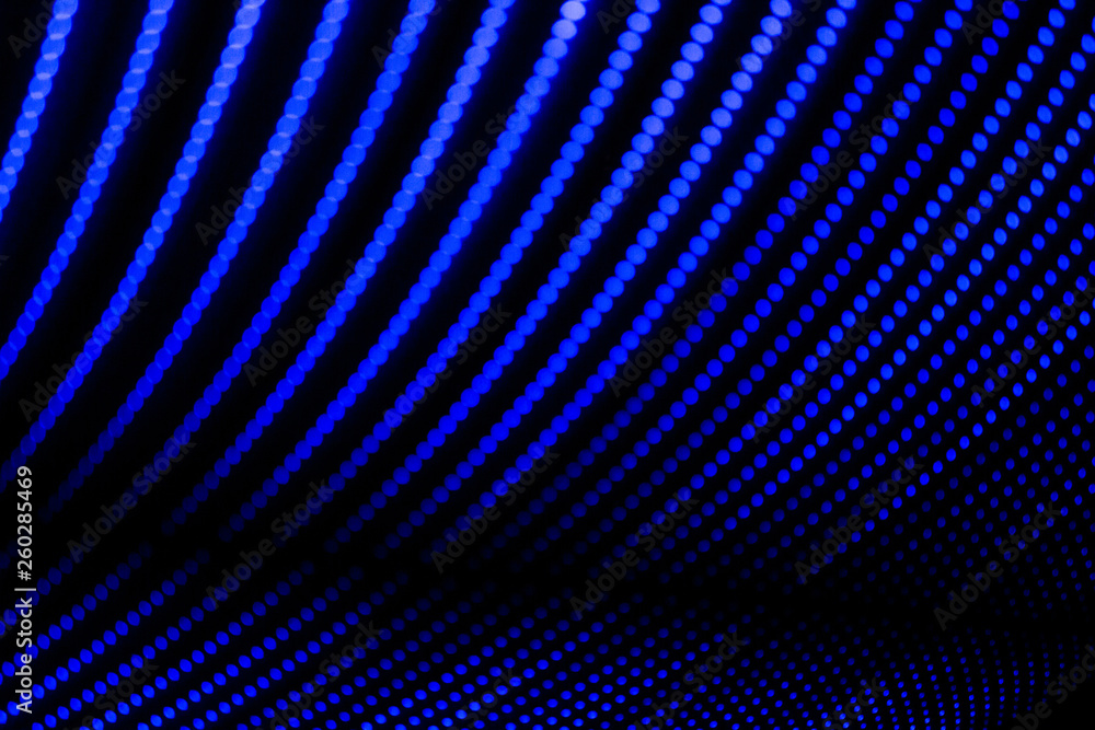 Naklejka premium Abstract lines of blue color. Painting made with light. Abstract pattern of lines formed by points.