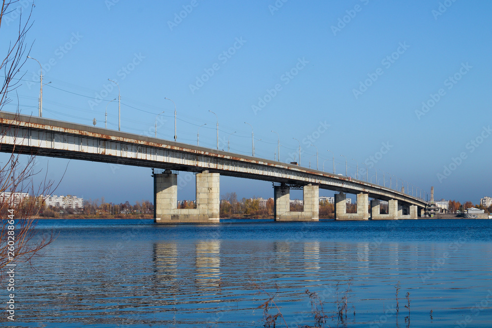 Autumn day in Arkhangelsk. View of the river Northern Dvina and automobile bridge in Arkhangelsk.