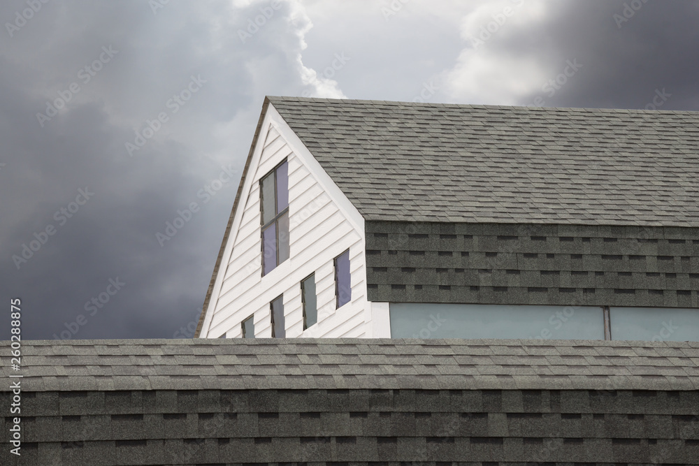 grey roof shingle with dark cloud. concept : preparing maintenance roof before rainy season.