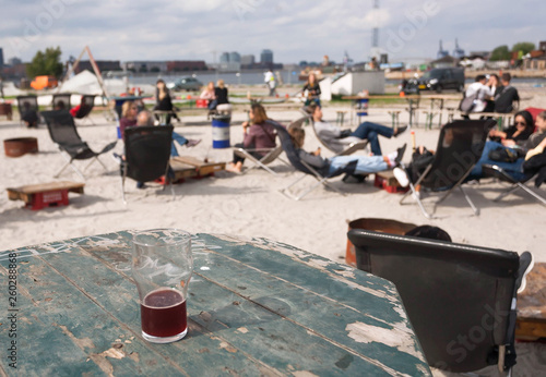 Photography People chilling with beer and food at fast food street market in Copenhagen, Denmark