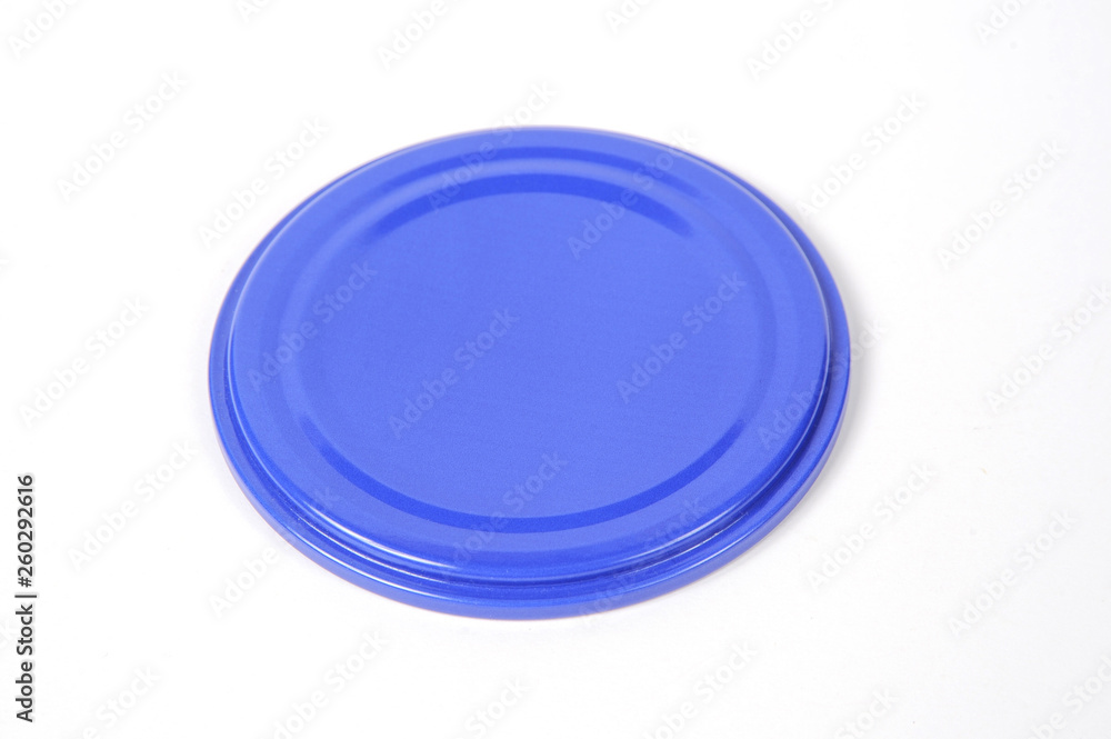 Screw cap for glass jars. For canning, canned food. Blue cap on white background Screw cap for glass jars. For canning, canned food. Blue cap on white background