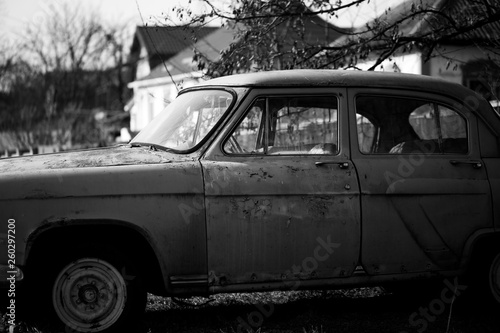 Photo of one old car in the village © sergeytay