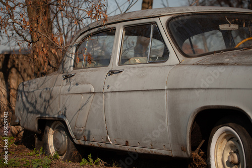 Photo of one old car in the village