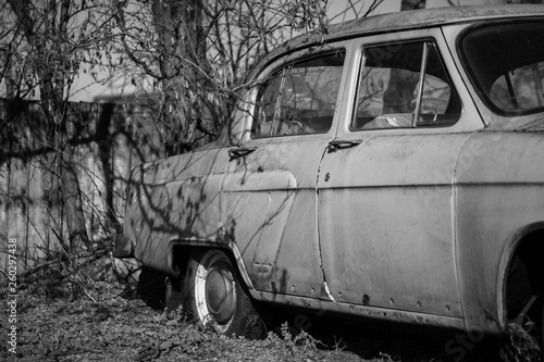 Photo of one old car in the village