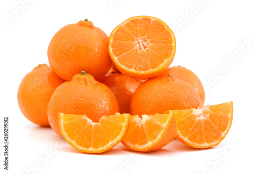 orange mandarines heap on white