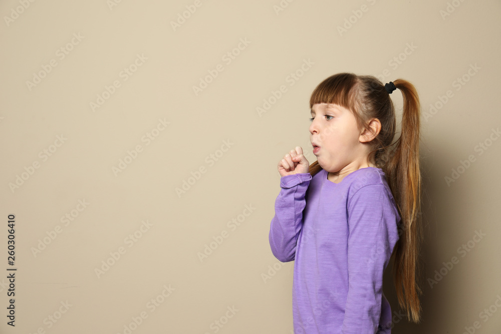 Cute little girl coughing against color background. Space for text Cute little girl coughing against color background. Space for text
