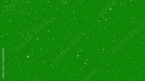 Isolated falling snow on green screen. 4K photo