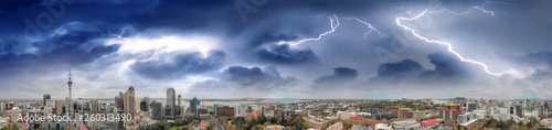 Auckland, New Zealand. Panoramic aerial view at sunset during a storm