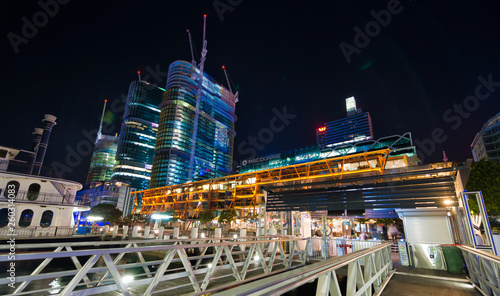 SYDNEY - NOVEMBER 6, 2015: Beautiful view of Sydney Harbor Brudge at dusk. Sydney attracts 20 million tourists every year photo