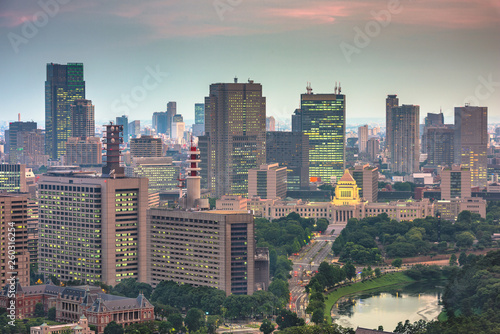 Tokyo, Japan cityscape over Chiyoda Ward with the National Diet Building at twilight. photo