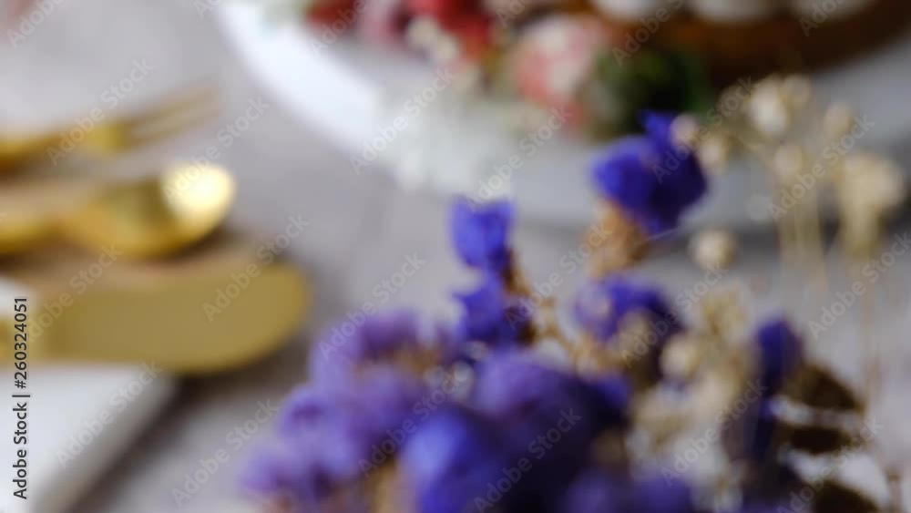 White cake Decorated with flower and berries. For celebrate party weddings, birthdays and events. White cake Decorated with flower and berries. For celebrate party weddings, birthdays and events.