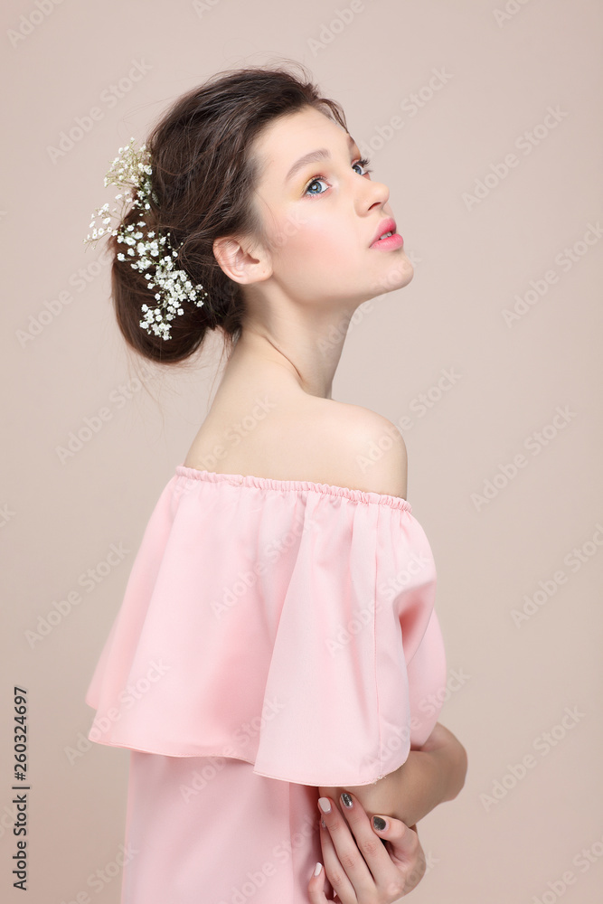 Beautiful girl, isolated on a powdery background, emotions, cosmetics Beautiful girl, isolated on a powdery background, emotions, cosmetics