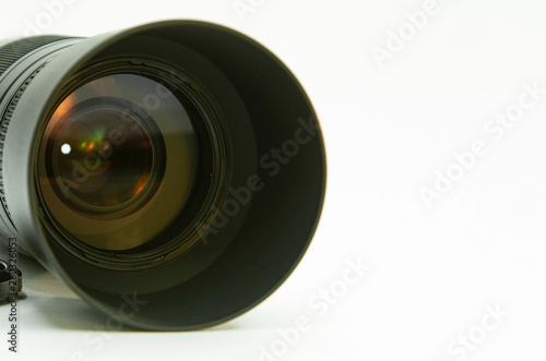  photographic lens with color reflection on a white background.